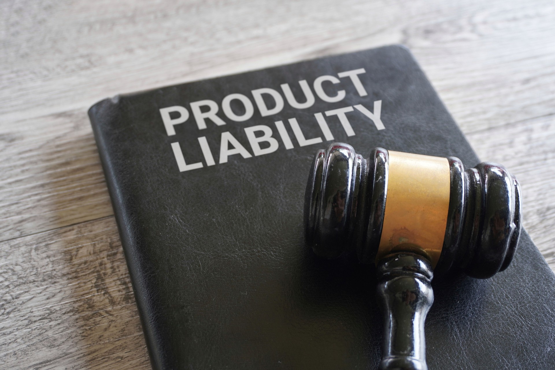 Closeup image of judge gavel and text PRODUCT LIABILITY